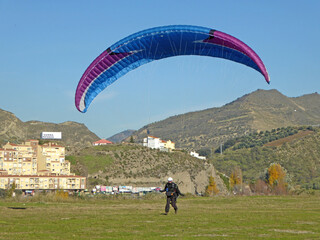 Poster - Paraglider landing at Cenes de la Vega in Spain