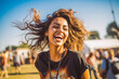© VisualProduction - Portrait of a beautiful energetic woman enjoying a music festival and having fun