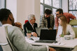© qunica.com - Multiracial team working together in the office