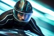 A Caucasian male bobsleigh athlete taking a statuesque pose the focus on his face while an abstract blurring of a sporting background indicates the bobsleigh track
