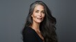 © Nad - Black middle age woman portrait with healthy face skin. Open smiling beautiful aging mature woman. Beauty and cosmetics skincare advertising concept grey background space for copy - generative AI