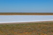 View of one of the salt lakes in the Astrakhan steppe on a sunny day. Russia