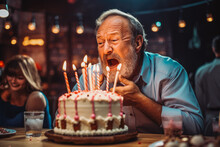 Happy Adult Man Blowing Out Candles On Birthday Cake. Older Man Celebrating Birthday. Generative AI