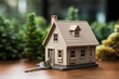 Toy mini house and house keys. Housing scheme and real estate concept