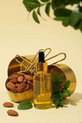 Sticker - Skin care and body care concept - almonds, almond oil