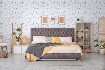 Canvas Print - Cozy bedroom interior with comfortable large bed