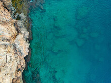 Aerial Bird's Eye View Of Cliffs And Turquoise Sea In Antalya Turkey