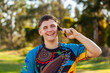 © Austockphoto - Aboriginal teenager using mobile phone to talk with mates