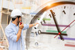 © Quality Stock Arts - Construction worker with schedule project timeline and working time clock for control timing punctual building process concept