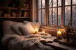 Gemütliche Leseecke im Winter. Weiße Kuscheldecke auf dem Sessel nahe einer Fensterbank in warmer Atmosphäre mit Kerzen.