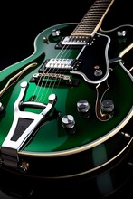 Vintage Hollow Body Guitar In Black And Chrome. Closeup Shot Of Semi-Hollow Acoustic Guitar With Green Fretboard And Eye-Catching Fish Background