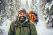 © Juha Saastamoinen - A young bearded man enjoys a snowy forest in Lapland