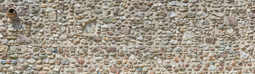 Poster - Typical rough natural stone wall in Tuscany.