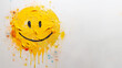 Yellow smiley face painted on white wall, copy space for text