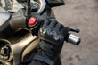 Close-up of a motorcyclist's hand speeding with his motorcycle. Speed and dangerous driving concept.