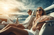 © scaliger - Two young women relax on luxury yacht, wealthy girls on cruise boat