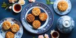 © DSimage - Moon cakes at mid autumn festival. Background food and drink tea and Mooncakes