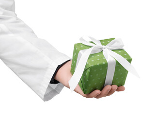 Wall Mural - Doctor holding gift box on white background, closeup. Medical present