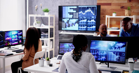 Poster - African Financial Data Analysts Using Dashboard On Screens