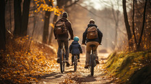 Family Cycling Trips In Autumn, Walks Along Paths In The Forest, Hiking, Collective Active Recreation. Children Spend Time With Their Parents.