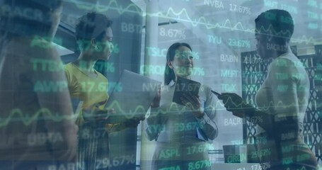 Canvas Print - Animation of trading board over diverse female coworkers standing and discussing in office