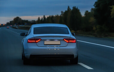 Canvas Print - Car moves on highway at night