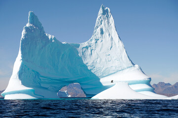 Wall Mural - arctic iceberg floating on arctic ocean in greenland