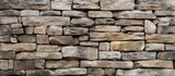 Fototapeta Do pokoju - Background or texture created by a portion of a stone wall