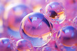 © Haydiddle - Purple and yellow soap bubbles in paint create an abstract design suitable for a colorful background.