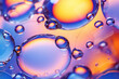 © Haydiddle - Purple and yellow soap bubbles in paint create an abstract design suitable for a colorful background.