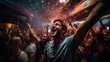© OKAN - Friends having fun by popping confetti balls at house party.