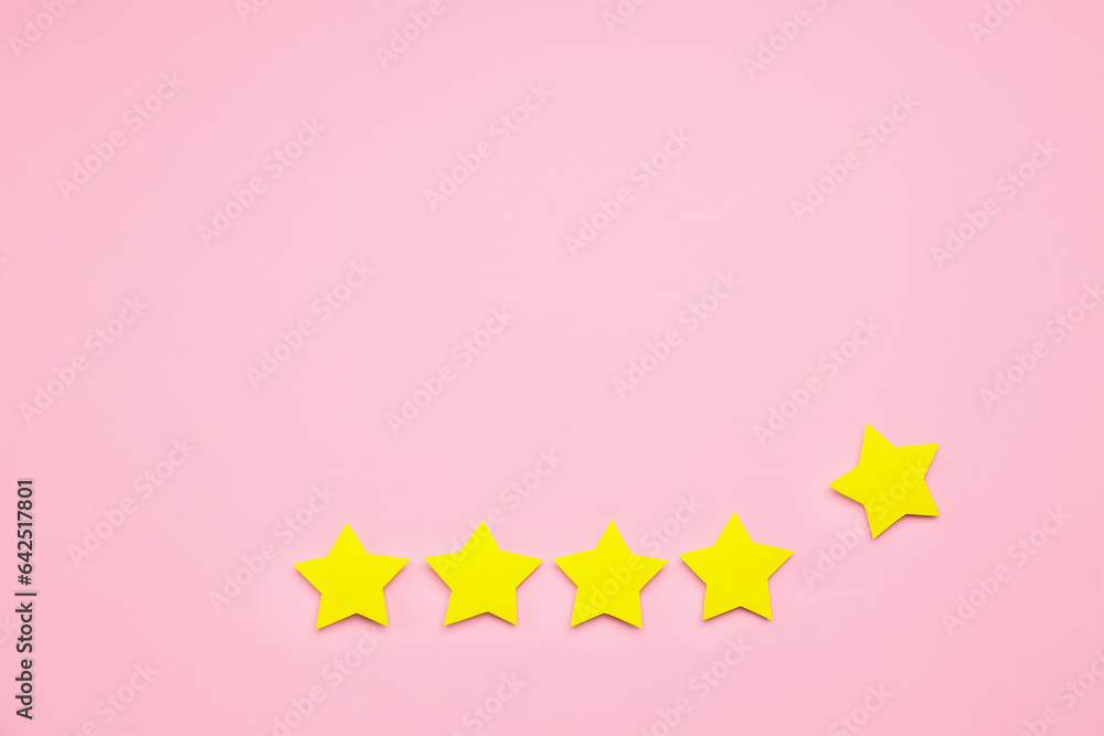 Five stars on pink background. Customer experience concept