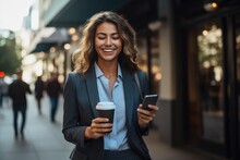 Young Business Woman Walking Street Holding A Cup Of Coffee And Cellphone