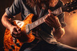 © mila103 - Close-up of the hands of a man playing the electric guitar