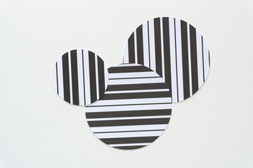 Sticker - three overlapping paper circles with stripes on blank paper