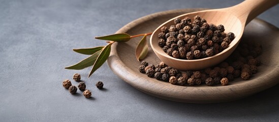 Aufkleber - Allspice on clay plate and wooden spoon on grey background