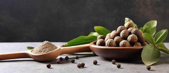 Aufkleber - Allspice on clay plate and wooden spoon on grey background
