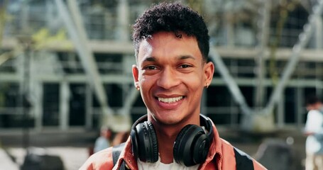 Wall Mural - Face, man and student smile at campus for education, learning and knowledge with headphones at college outdoor. Portrait of cool gen z guy studying at academy, university building and scholarship