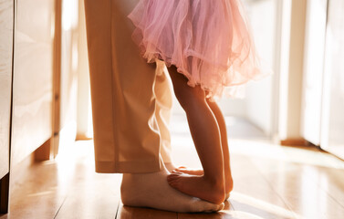 Poster - Dance, learning and feet of father and daughter for ballet, support and love. Music, help and youth with closeup of man and young girl in family home for teaching, creative and princess together