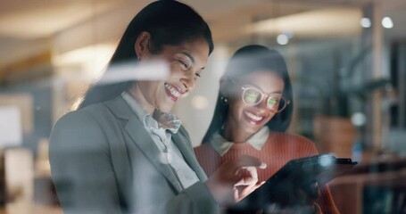 Fototapete - Business women, tablet and teamwork in night office for social media marketing, funny meme and research in window. Happy analyst or manager on digital technology for collaboration or project planning