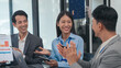 © Phushutter - Clap your hands with joy, Asian business people teamwork strategy corporate meeting progress, brainstorming ideas, leadership decision-making executives, productive people engaged in problem-solving
