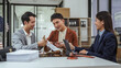 © Phushutter - Legal consultation, asian lawyers team meeting post-contract, contract finalization, lawyers discussing agreements, contract review session, agreement assessment, legal experts in conversation