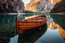 An Old Wooden Boat In The Middle Of A Lake With Mountains And Trees Reflected In The Still Calm Water At Sunset