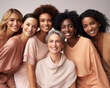 © Glittering Humanity - Beauty and unity, a diversety group of beautiful women of all skin tones and races together posing in the skin care ad campaign. A multiracial group of women, inclusivity face body positivity