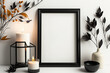 © Sona - Mock up a white shelf with a black frame decorated with autumnal branches and candles. autumnal idea frame for a portrait against a white wall. Generative AI