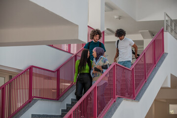 Wall Mural - A group of happy diverse college students are walking in the university hallway.