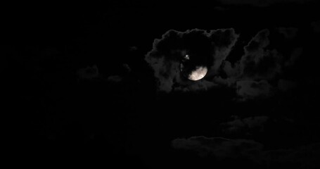 Wall Mural - Full Moon inside clouds during night
