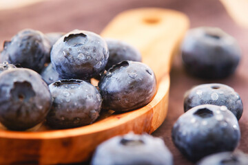 Wall Mural - blueberries on wooden background, blueberries