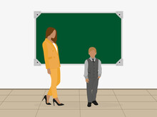 A Boy In A School Uniform And A Teacher Stand Near The Blackboard