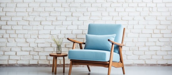 Poster - Comfortable armchair beside white brick wall in stylish room